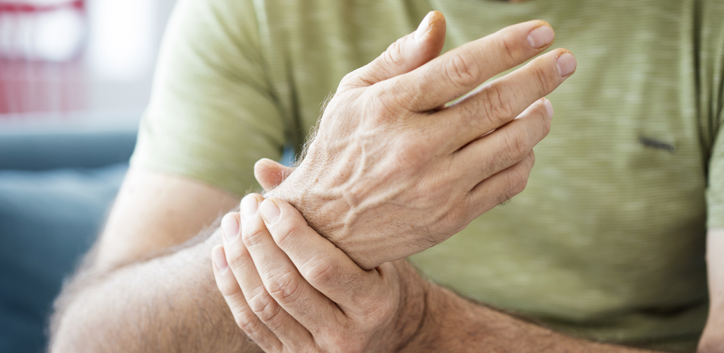 Mature person with wrist joint stiffness